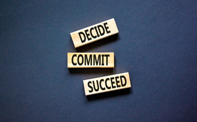 Wall Mural - Decide commit succeed symbol. Concept word Decide Commit Succeed on beautiful wooden block. Beautiful black table black background. Business decide commit succeed concept. Copy space.