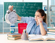 © Elnur - Female student sitting in the classroom