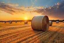 Hay Bales On The Fields At Sunset