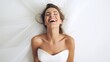 Happy bride smiling, closed eyes, carefree dreaming. Over white background.