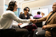 © Wosunan - Group of diverse business people attending a meeting in a modern office.