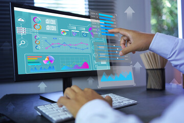 Wall Mural - Business data visualization dashboard analytics on pc screen business data scientist with ai analysis and bar, donut, pie chart data summarise management digital market statistic summary analytics.