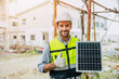 © Quality Stock Arts - Engineer thumbs up happy with Solar panel for saving energy recommend for modern home construction
