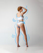 © Lustre Art Group  - Rear view of sensual woman in white lingerie with drawn blue silhouette around body posing over studio background. body positivity