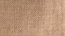 Texture of canvas.  Vector seamless texture of burlap, canvas. Beige, brown. Vector background.