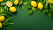 Decorative fresh lemons on green with copyspace