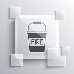 Wall Mural - Grey Fire bucket icon isolated on grey background. Metal bucket empty or with water for fire fighting. Square glass panels. Vector