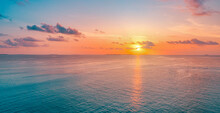 Aerial Panoramic View Of Sunset Over Ocean. Colorful Sky Clouds Water. Beautiful Serene Scene, Wide Angle Seascape. Drone View, Majestic Stunning Nature Background. Best Sea Sky Sunrise. Inspire Views