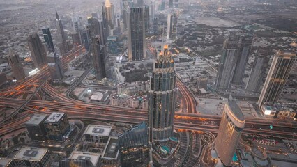 Wall Mural - Dubai, UAE, United Arab Emirates. 4K View Form Viewpoint on Burj Khalifa time lapse. Day to Night timelapse. Change Transition To Night. City Traffic Under Khalifa Tower.
