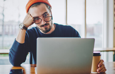 Wall Mural - Shocked male freelancer amazed from received email with information about mistake