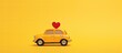 Valentines Day themed toy taxi car with heart design on yellow backdrop symbolizing love and romance