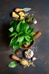 Wall Mural - Ingredients for making traditional italian sauce pesto. Top view.