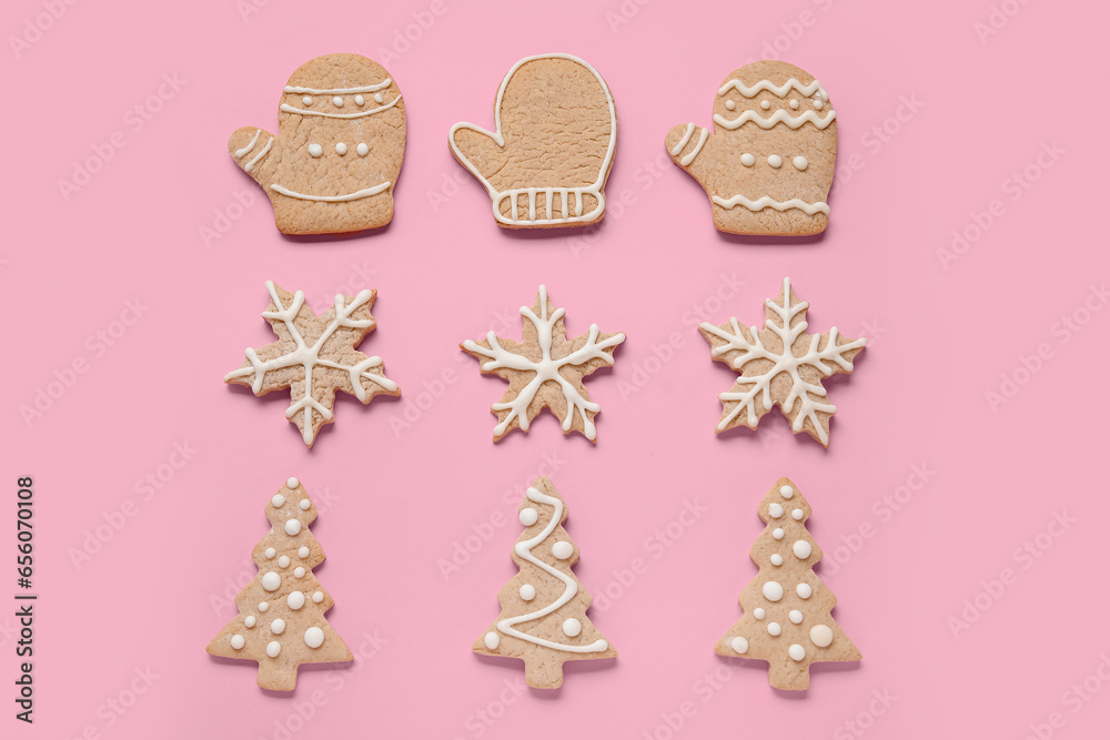 Set of different Christmas cookies on pink background