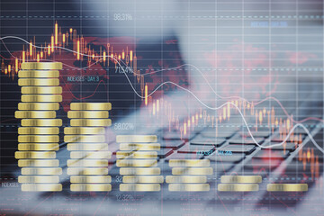 Poster - Close up of laptop computer with creative forex chart hologram with declining stacked coins on blurry background. Financial recession, plummeting trade concept. Double exposure.