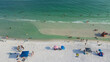 © trongnguyen - Sugar white sandy beach Gulf shores with crowded of people swimming, relaxing in colorful tents, beach canopy, lounge chair, turquoise water, South Walton beach, Destin, Florida