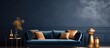Stylish living room with blue velvet sofa golden side table pouf pillows and elegant decorations Dark blue wallpaper Template with space for copying