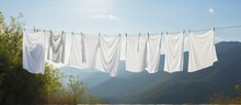 Sheets Drying Outside On A Scenic Backdrop In The Sun