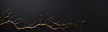 Golden leaves on a black background with copy space, bay leaves, and branches. Autumn elegant, luxury concept. 