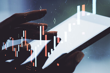 Poster - Double exposure of abstract creative financial chart with finger clicks on a digital tablet on background, research and strategy concept