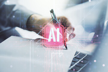 Poster - Creative artificial Intelligence symbol concept with hand writing in diary on background with laptop. Double exposure