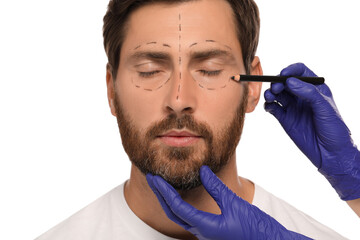 Poster - Doctor with pencil preparing patient for cosmetic surgery operation on white background, closeup