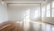 © anmitsu - A large, empty room with a wooden floor, white walls, and large windows that let in bright natural light.