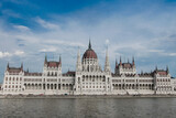 Fototapeta Lawenda - Hungarian Parliament Building with Blue Sky in the summer. Stock Photo.