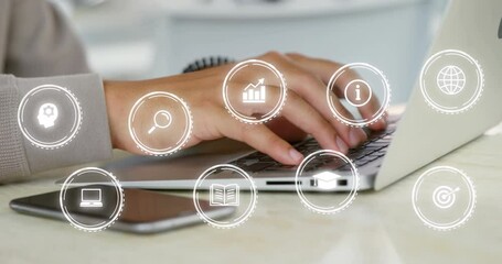 Poster - Animation of digital icons over biracial businesswoman using laptop in office