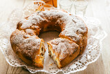 Fototapeta Młodzieżowe - Sweet donut with nuts, apples and raisins