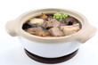 Bak Kut Teh with meat and vegetables in a pot on a white background, food photography, product presentation, product display, banner background