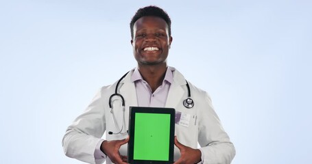 Sticker - Doctor, tablet green screen and happy black man with website design, hospital info or medical studio brand. Cardiology portrait, mockup data space and surgeon show clinic news on blue background