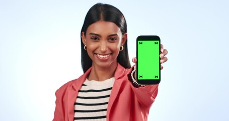 Poster - Business woman, phone green screen and mockup for presentation or advertising information in studio. Professional face of indian employee on mobile app with video tracking marker on a blue background