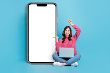 Poster - Full length photo of girl java coder wear pink knit sweater website direct fingers remote display convenient menu isolated on blue color background