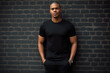 Stylish African American Man Poses Against Brick Wall In Black Tee Mockup