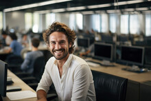 A Man Smiling At His Workplace In A Corporate Office.