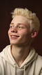 portrait of young 20 year old albino boy smiling, with dark brown background