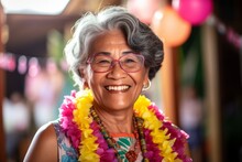 Portrait Of A Happy Senior Asian Woman Smiling At The Camera