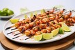 skewered shrimp coated with a glaze of chili and lime