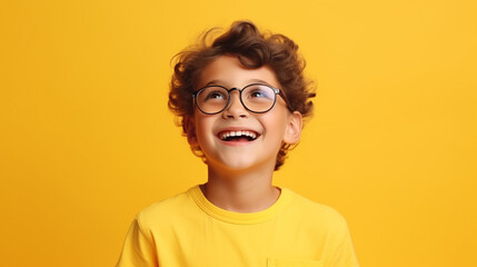 Wall Mural - Happy boy kid isolated on studio background