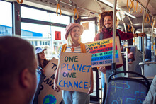 Diverse Group Of Environmentalist Going To A Protest In The City On A Bus