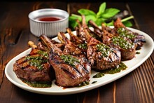 grilled lamb chops glazed with a thick savory sauce