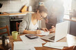 © Geber86 - Young couple doing financials in the kitchen