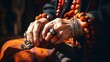 © yj - Macro shot of an elderly lady's jewelry contrasted against the rich colors of Moroccan souks. ethnic traditional costumes and accessories. generative AI