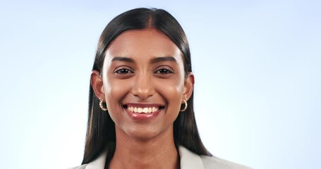 Wall Mural - Flirt, face and woman blowing kiss in a studio for love, romantic or cute expression. Happy, smile and portrait of Indian female model with hand gesture for romance isolated by blue background.