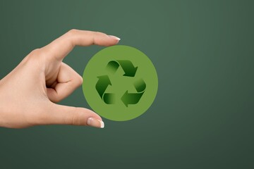 Sticker - Business woman hold green card with Recycle symbol.