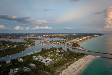 Wall Mural - Aerial evening seascape with Nokomis sandy beach in Sarasota County, USA. Many tourists enjoing summer vacation time swimming in warm Mexico gulf water and sunbathing on hot Florida sun