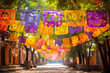 Papel picado tissue paper banners strung across street in Mexico, holiday, Day of the Dead
