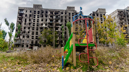 destroyed and burned houses in the city during the war in Ukraine