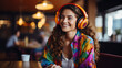 © Henryzoom - Beautiful young woman in headphones and with a microphone conducts a podcast, blogger communicates with her subscribers on social networks