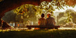 © v.senkiv - Mature couple sitting against a tree at park